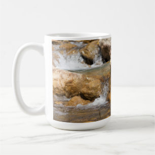 Stormy stream in spring coffee mug