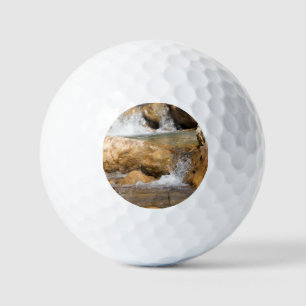 Stormy stream in spring golf balls