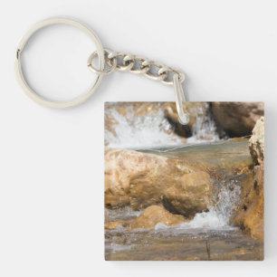 Stormy stream in spring key ring