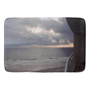 Stormy Sunrise over the Ocean Bath Mat