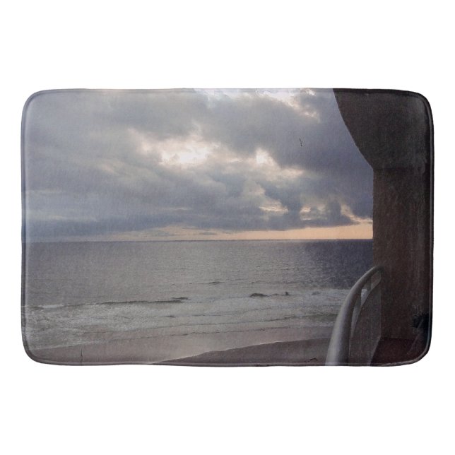 Stormy Sunrise over the Ocean Bath Mat (Front)