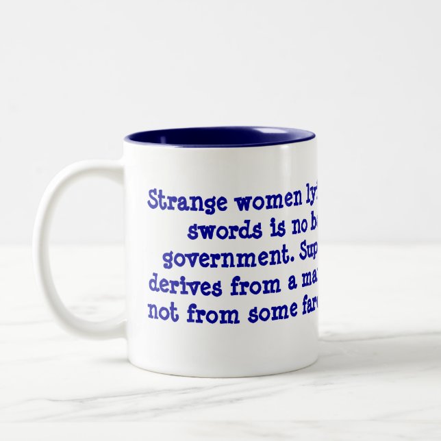 Strange women lyin' in ponds distributin' sword... Two-Tone coffee mug (Left)