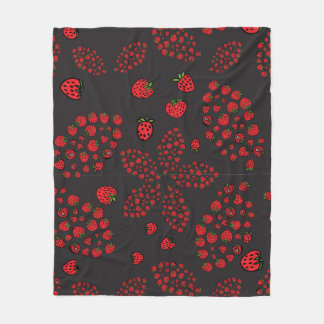 strawberry flowers on black fleece blanket