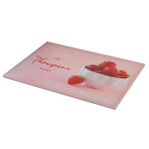 Strawberry Fruits In A Bowl On Pink Family Name Cutting Board
