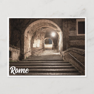 Street with stone stairs with arch in Rome, Italy Postcard