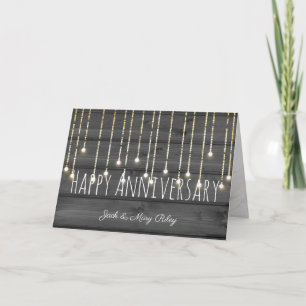 string lights on black rustic wood for anniversary card