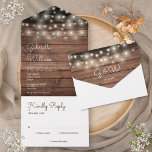 String Lights Rustic Barn Wood Monogram Wedding All In One Invitation<br><div class="desc">All in one wedding invitation featuring pretty string lights,  your monogram initials and elegant modern minimalist typography on a rustic wood panels background. The invitation includes a perforated RSVP card that can be individually addressed or left blank for you to handwrite your guest's address details. Designed by Thisisnotme©</div>