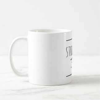 Student tears coffee mug