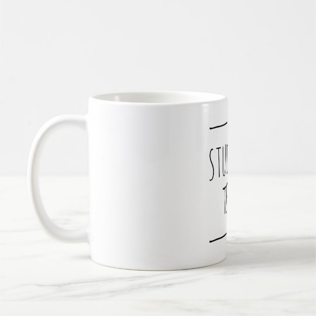 Student tears coffee mug (Left)