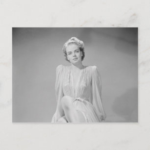 Studio portrait of young woman in nightgown postcard
