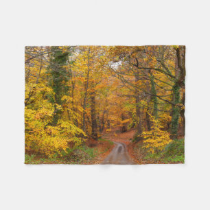 Stunning English autumn forest colors with path Fleece Blanket
