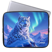 Stunning Snow Leopard on Mountain Rock