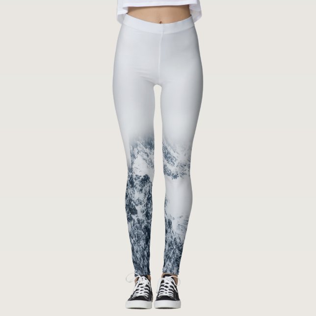 Stunning snowy mountains covered by clouds leggings (Front)