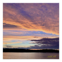Stunning sunset with the ocean glossy poster.
