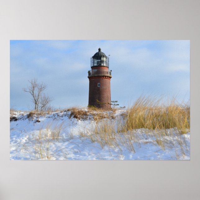 Sturdy Lighthouse on a Rocky Coast in Winter Poster (Front)