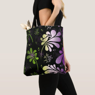 Stylised colourful leaves and flowers on black tote bag