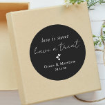 Stylish Black & White Love is Sweet Wedding Favour Classic Round Sticker<br><div class="desc">The "Stylish Black & White Love is Sweet Wedding Favour Classic Round Sticker" combines timeless elegance with modern flair. Its sleek black and white design and heartfelt message convey sincere appreciation to guests. Perfect for sealing favour bags or adorning favour boxes, this sticker adds a touch of sophistication to your...</div>