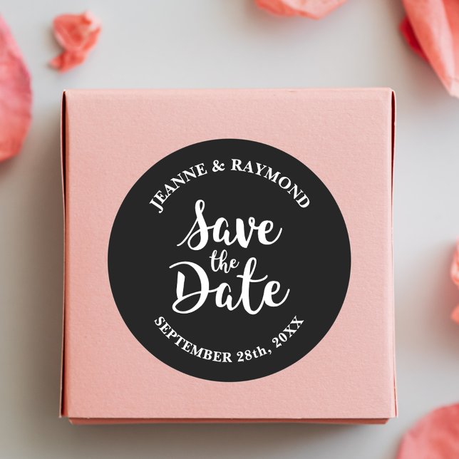 Stylish Calligraphy Save the Date Black Wedding Classic Round Sticker (Stylish black calligraphy sticker adds elegant charm to wedding save the dates.)