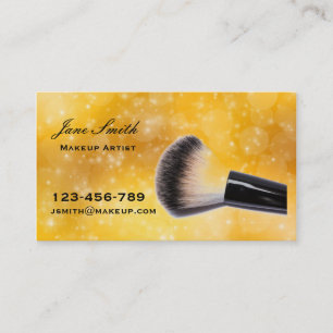 Stylish gold makeup artist with makeup brush business card