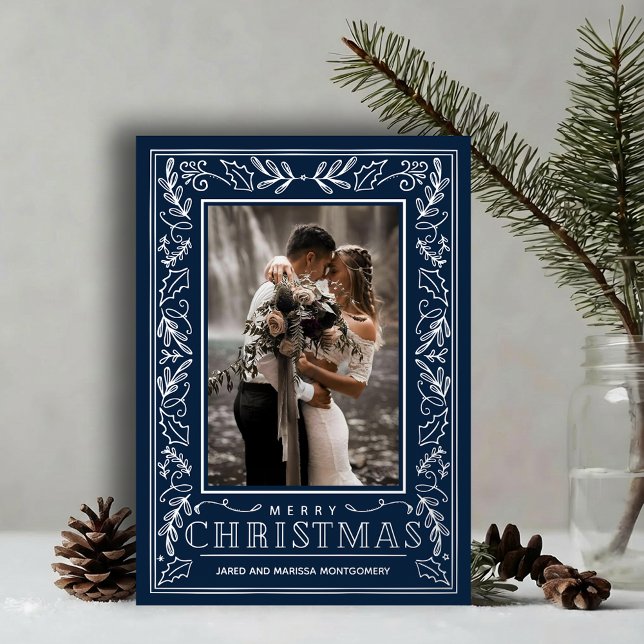Stylish Greenery on Blue Christmas Photo Silver Foil Holiday Card (Stylish REAL SILVER FOIL winter foliage border on navy blue photo Christmas holiday cards)