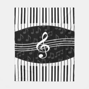 Stylish musical note clef and piano keys fleece blanket
