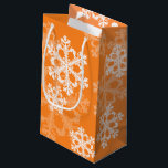 Stylish Orange Snowflakes Modern Christmas pattern Small Gift Bag<br><div class="desc">Stylish and modern festive pattern featuring an orange background and elegant, white snowflakes. The clean, geometric snowflake design brings a touch of winter charm, adding sophistication and a festive flair. Perfect for wrapping gifts in a memorable and eye-catching way. This design seamlessly blend modern aesthetics with holiday spirit, making it...</div>