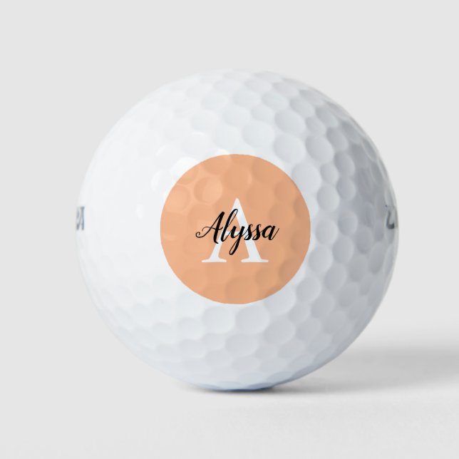 Stylish Peach Monogram Script Golf Balls (Front)