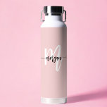 Stylish Pink Modern Script Girly Monogram Name Water Bottle<br><div class="desc">Stay hydrated in style with the Stylish Pink Modern Script Girly Monogram Name Water Bottle. This sleek, reusable bottle features a soft pink background and an elegant monogram in a modern script font, adding a personalised touch. Perfect for gym workouts, office use, or on-the-go hydration, this water bottle combines fashion...</div>