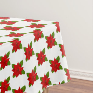Stylish Red Poinsettia Flowers on White Tablecloth