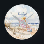 Stylish Watercolor Beach Ocean Monogram Round Clock<br><div class="desc">You can always be sitting on this beach looking out into water -- the gentle breezes blowing - enjoying the moment. Yes, it is indeed your own personal "beach therapy" -- with the lovely dreamy watercolor scene. Perfect for beach lovers, beach houses, or anyone who feels inspired by the ocean!...</div>