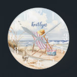 Stylish Watercolor Beach Ocean Monogram Round Clock<br><div class="desc">You can always be sitting on this beach looking out into water -- the gentle breezes blowing - enjoying the moment. Yes, it is indeed your own personal "beach therapy" -- with the lovely dreamy watercolor scene. Perfect for beach lovers, beach houses, or anyone who feels inspired by the ocean!...</div>