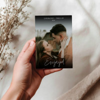 Stylish We’re Engaged photo Announcement