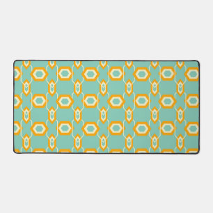 Stylized geometric pattern in bold orange hexagon desk mat