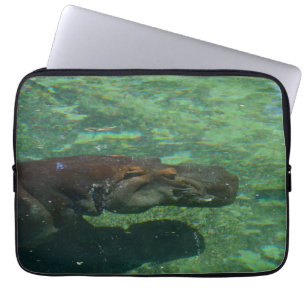 **"Submerged Serenity: A Hippo Swimming Gracefully Laptop Sleeve