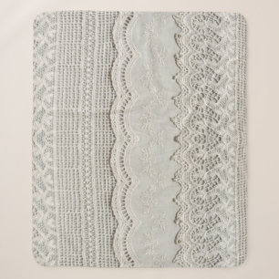 Subtle white lace, textile close-up. sherpa blanket