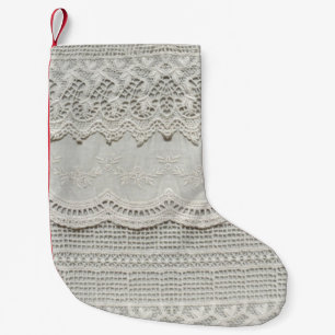 Subtle white lace, textile close-up. small christmas stocking