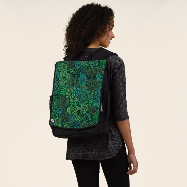 Succulent garden in green backpack (Worn)