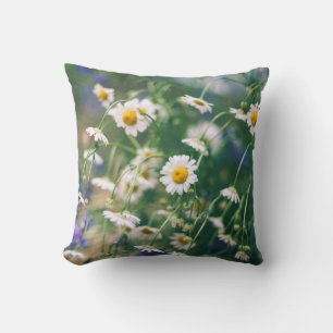 Summer flower pattern in green meadow with blue an cushion