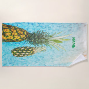 Summer pineapple in the pool beach towel