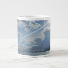 Sun and Clouds Over Water and City Speciality Mug