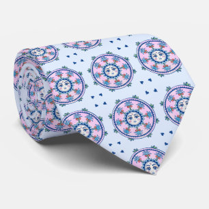 Sun and palm trees circling tie