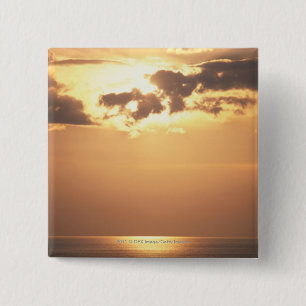 Sun goes down on the ocean 15 cm square badge