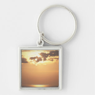 Sun goes down on the ocean key ring
