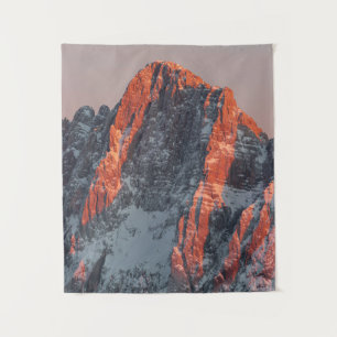 Sun light on snowy mountains tapestry