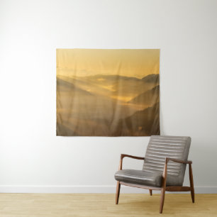 Sun light shining on morning fog tapestry