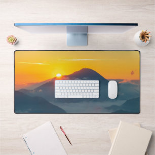 Sun peaking behind Uršlja gora, Slovenia Desk Mat