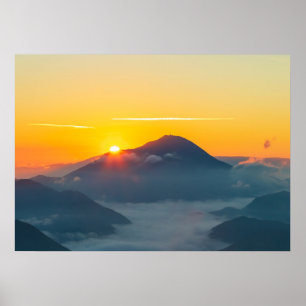 Sun peaking behind Uršlja gora, Slovenia Poster