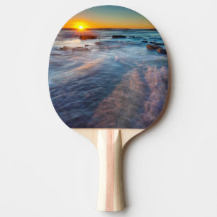 Sun rays illuminate the Pacific Ocean Ping Pong Paddle
