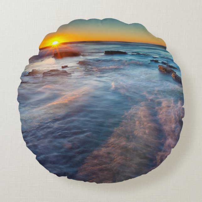 Sun rays illuminate the Pacific Ocean Round Cushion (Front)