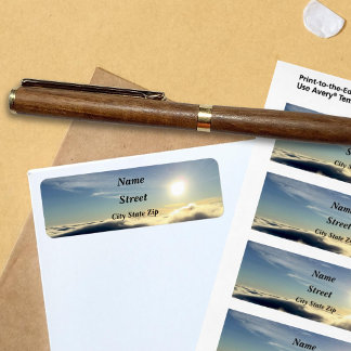 Sun rising above the clouds over Colorado Springs. Return Address Label